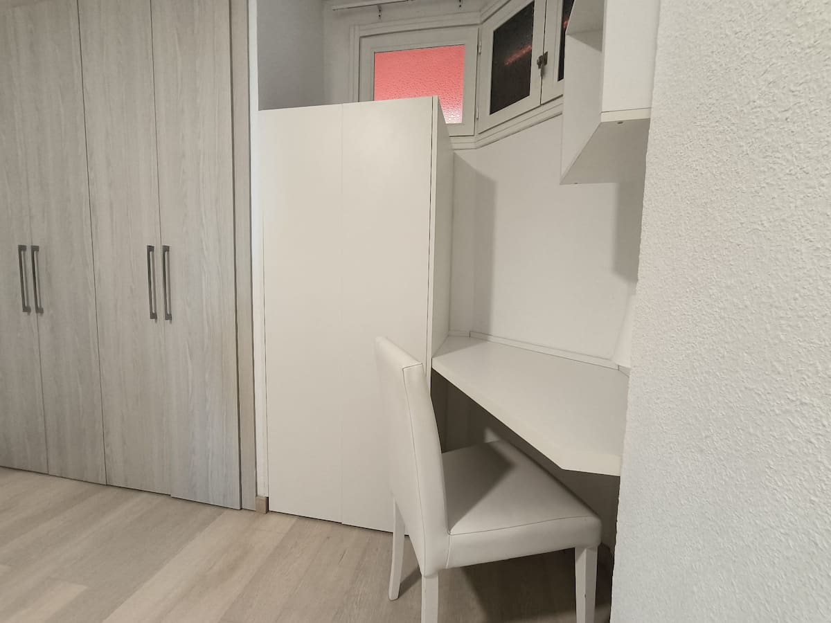 Dedicated workspace beside the bedroom